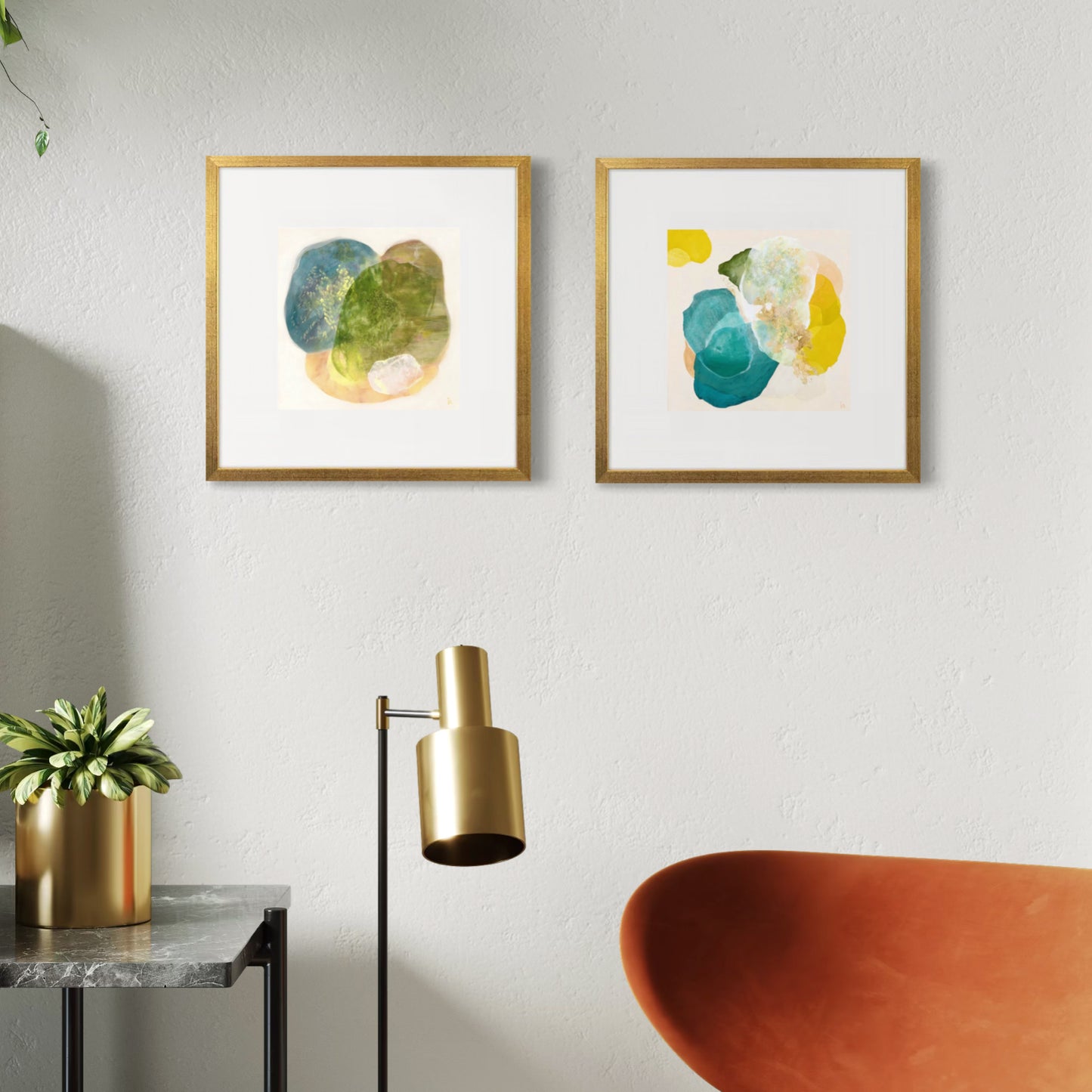 Two mini abstract art prints from the Cool Collection styled in a modern livning room.