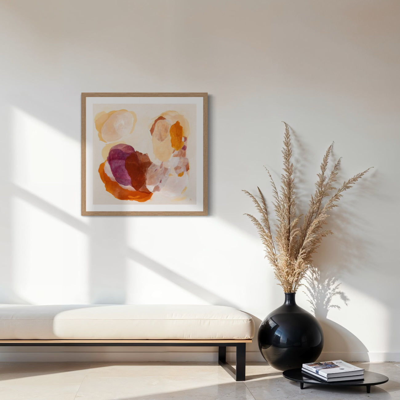Soulful abstract art print on paper in a classic frame, natural finish. Hanging in a seating area. Ingeborg Andersson Art