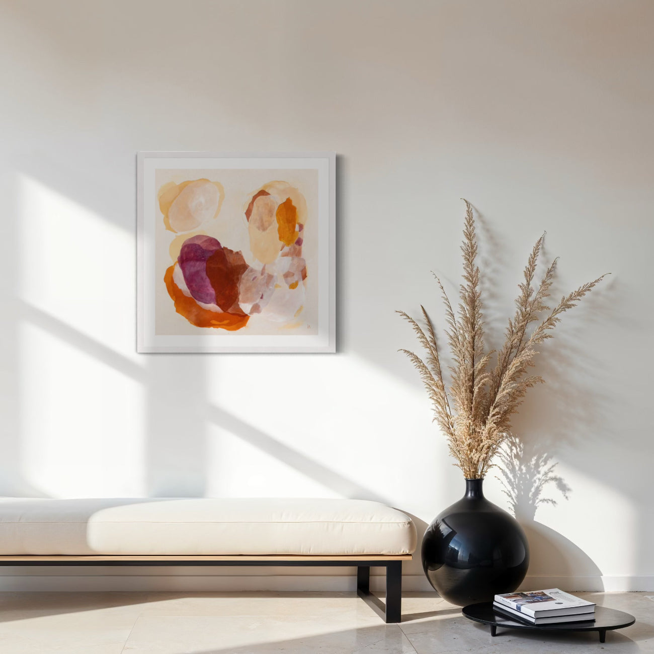 Soulful abstract art print on paper in a classic frame, white finish. Hanging in a seating area. Ingeborg Andersson Art