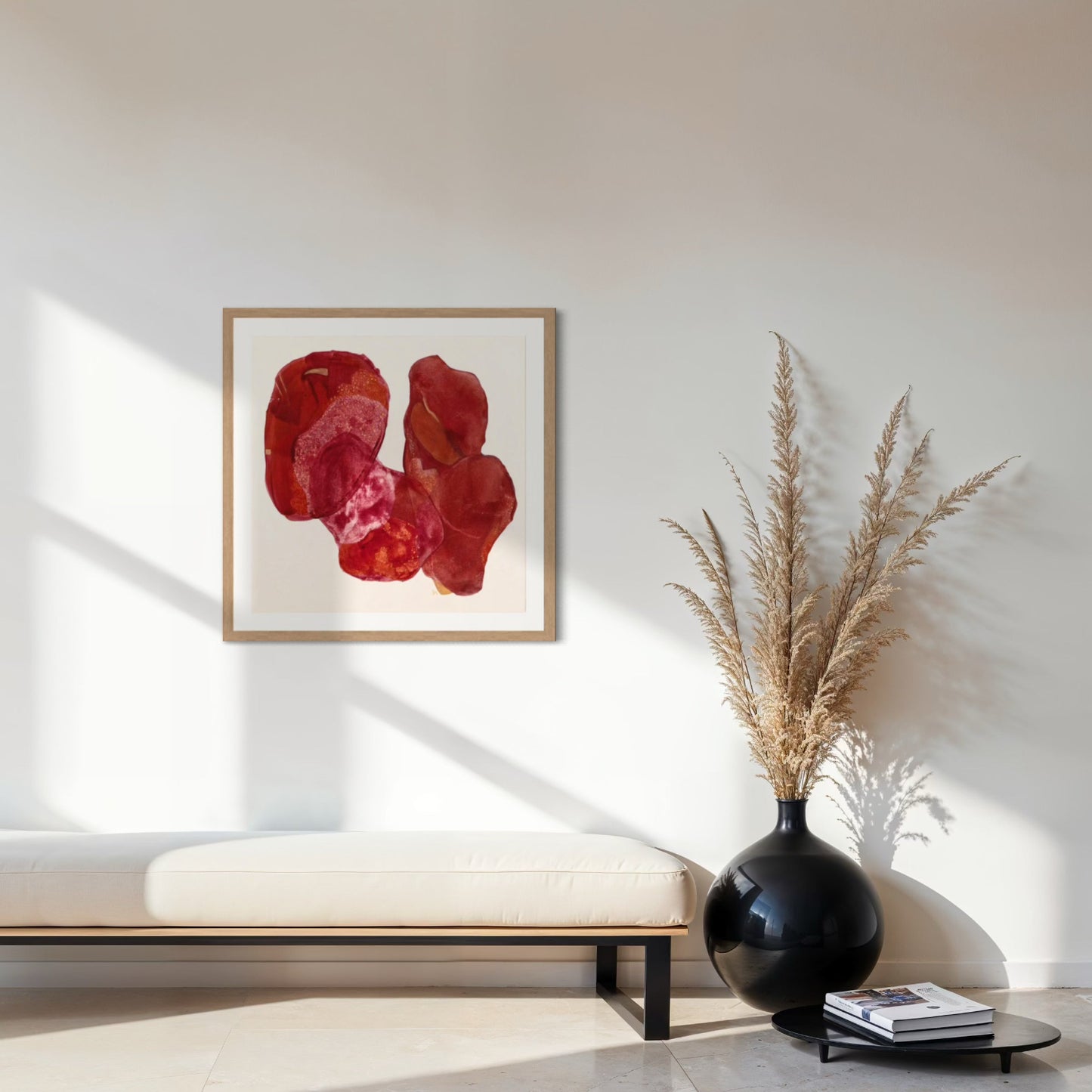 Golden Feather, statement abstract art print on paper. Framed in natural finish,  hanging in a seating area.  Ingeborg Andersson Art