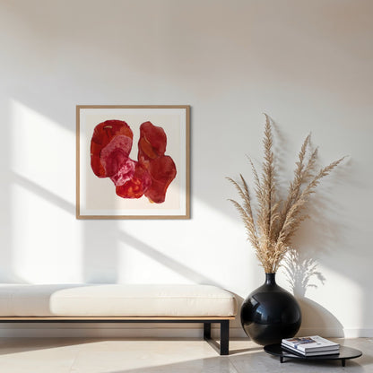Golden Feather, statement abstract art print on paper. Framed in natural finish,  hanging in a seating area.  Ingeborg Andersson Art