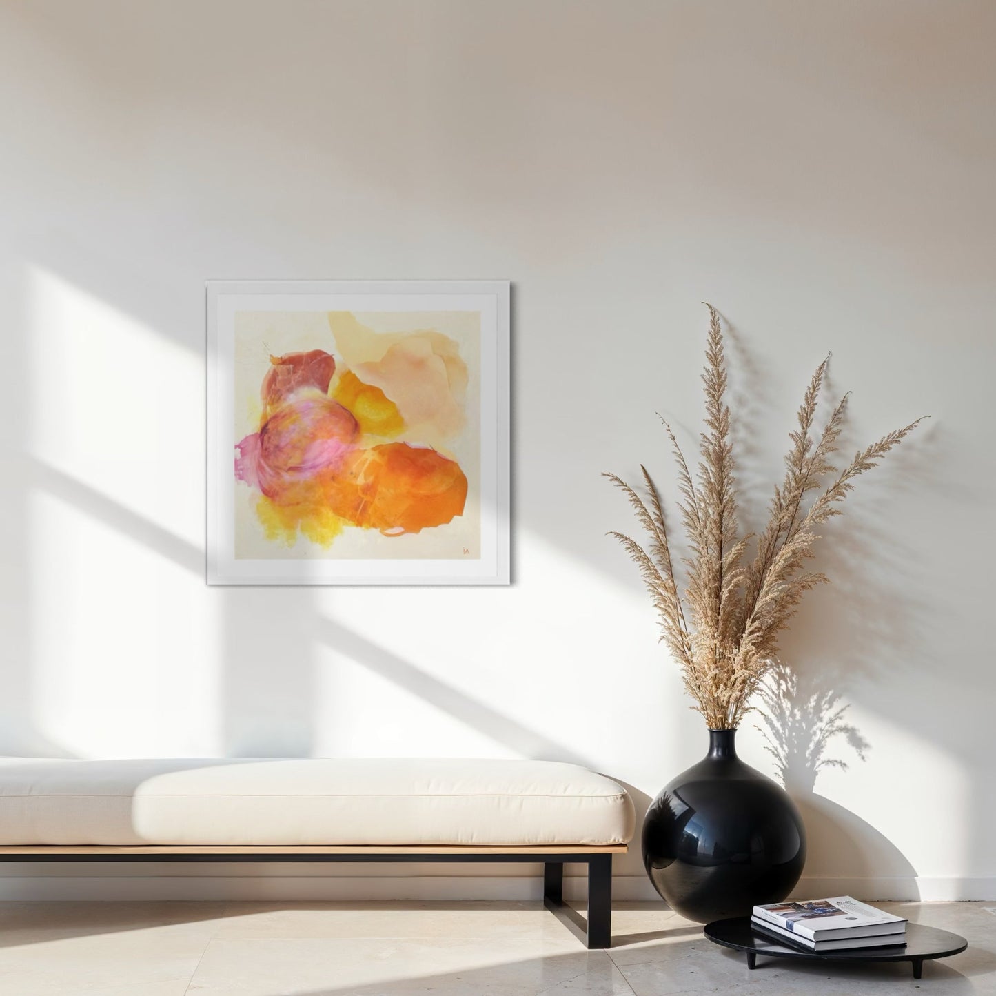Happy Grape, colorful abstract wall art print on paper, framed in a white finish. Hanging above a bench. Ingeborg Andersson Art