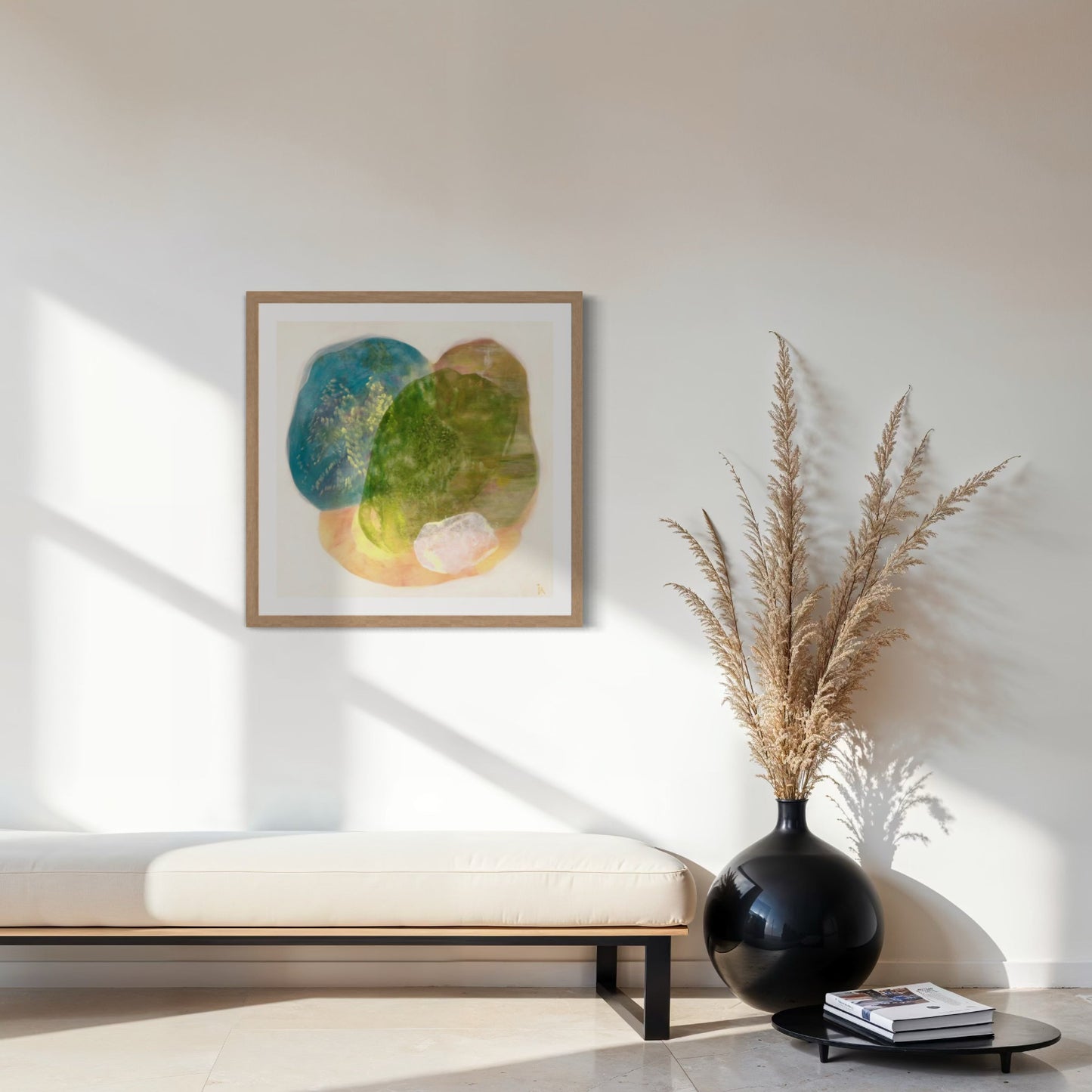 Calming abstract wall art print on paper, classic frame in natural finish in a seating area. Ingeborg Andersson Art
