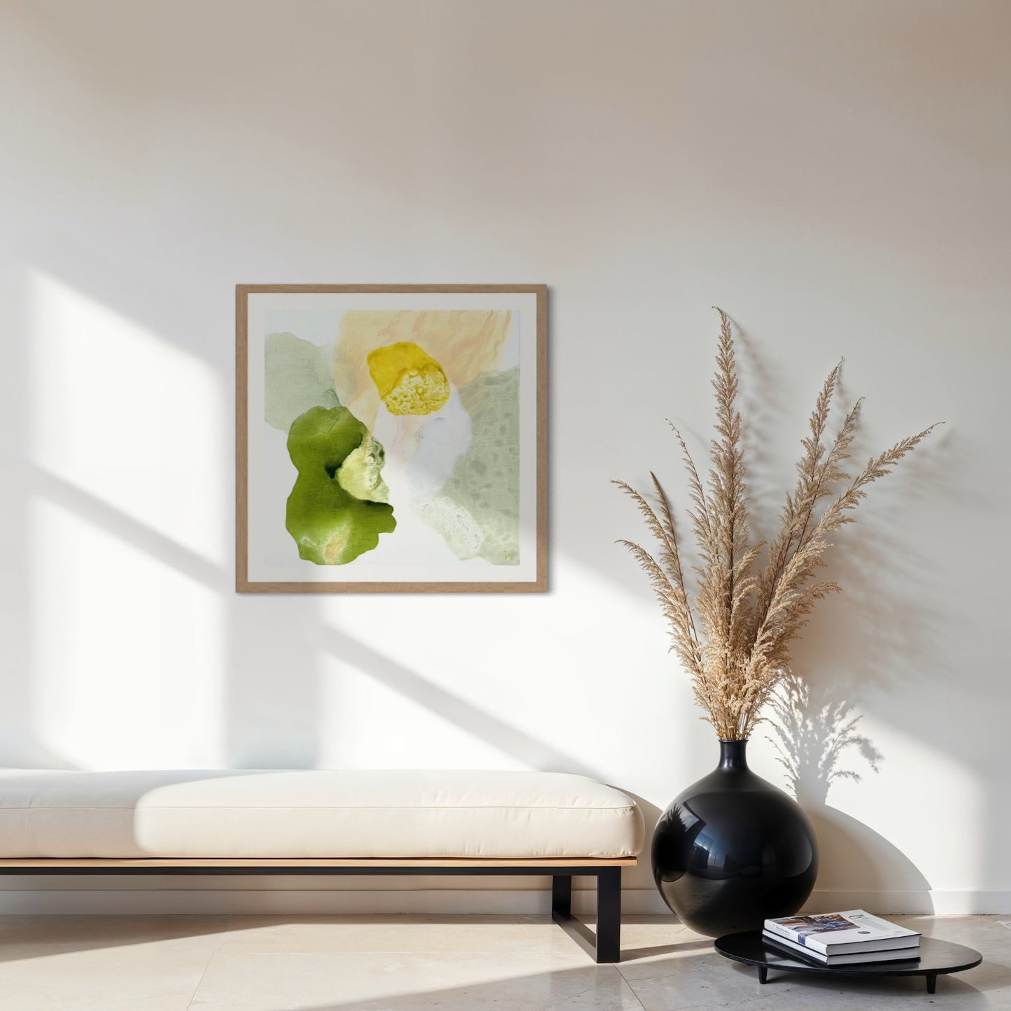 Yellow Diamond, modern abstract wall decor print on paper, framed in natural finish. Hanging above a bench. Ingeborg Andersson Art