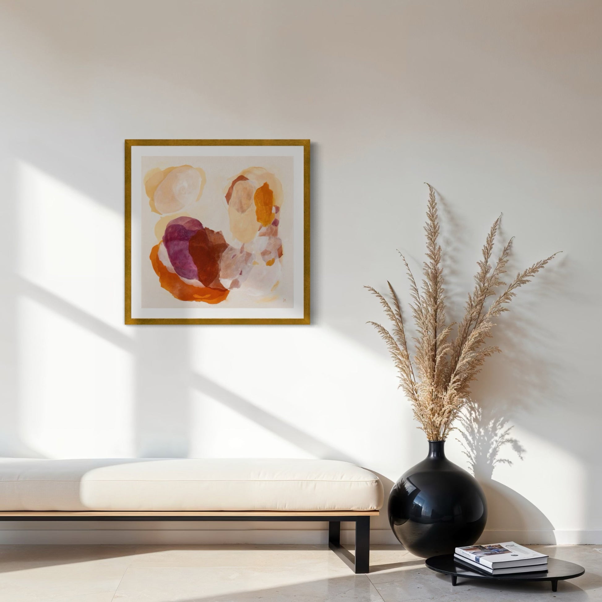 Soulful abstract art print on paper in a classic frame, gold finish. Hanging in a seating area. Ingeborg Andersson Art