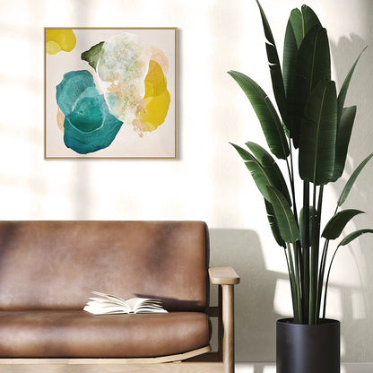 Cosmic Gold, bold abstract art print for living room with vibrant teal and golden yellow contrasts and rich texture. Hanging in a reading nook. Ingeborg Andersson Art