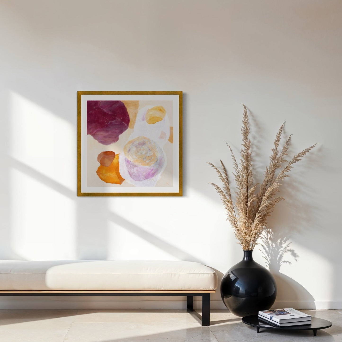 Serene abstract wall art print on paper framed in gold finish. Hanging in a seating area.  Ingeborg Andersson Art