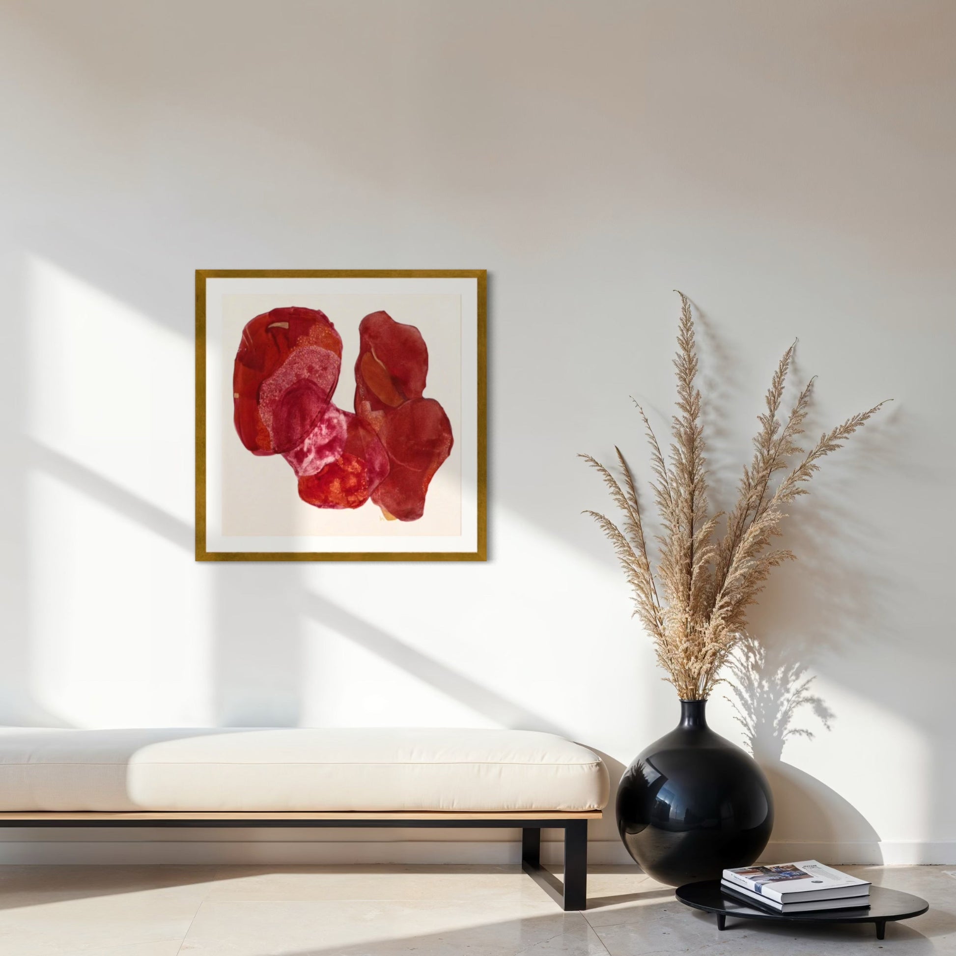Golden Feather, statement abstract art print on paper. Framed in gold finish,  hanging in a seating area.  Ingeborg Andersson Art