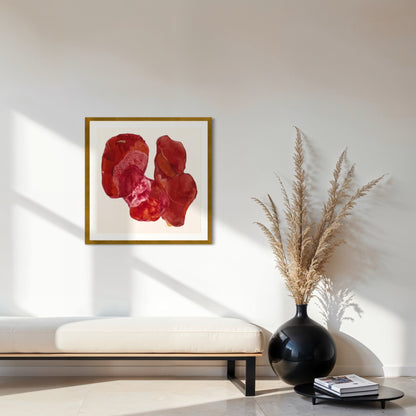 Golden Feather, statement abstract art print on paper. Framed in gold finish,  hanging in a seating area.  Ingeborg Andersson Art