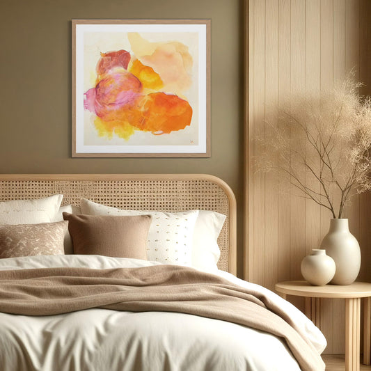 Happy Grape, colorful abstract wall art print with glowing pink, coral and golden yellow organic forms full of joy on paper, hanging in a bedroom, scandinavian style. Ingeborg Andersson Art