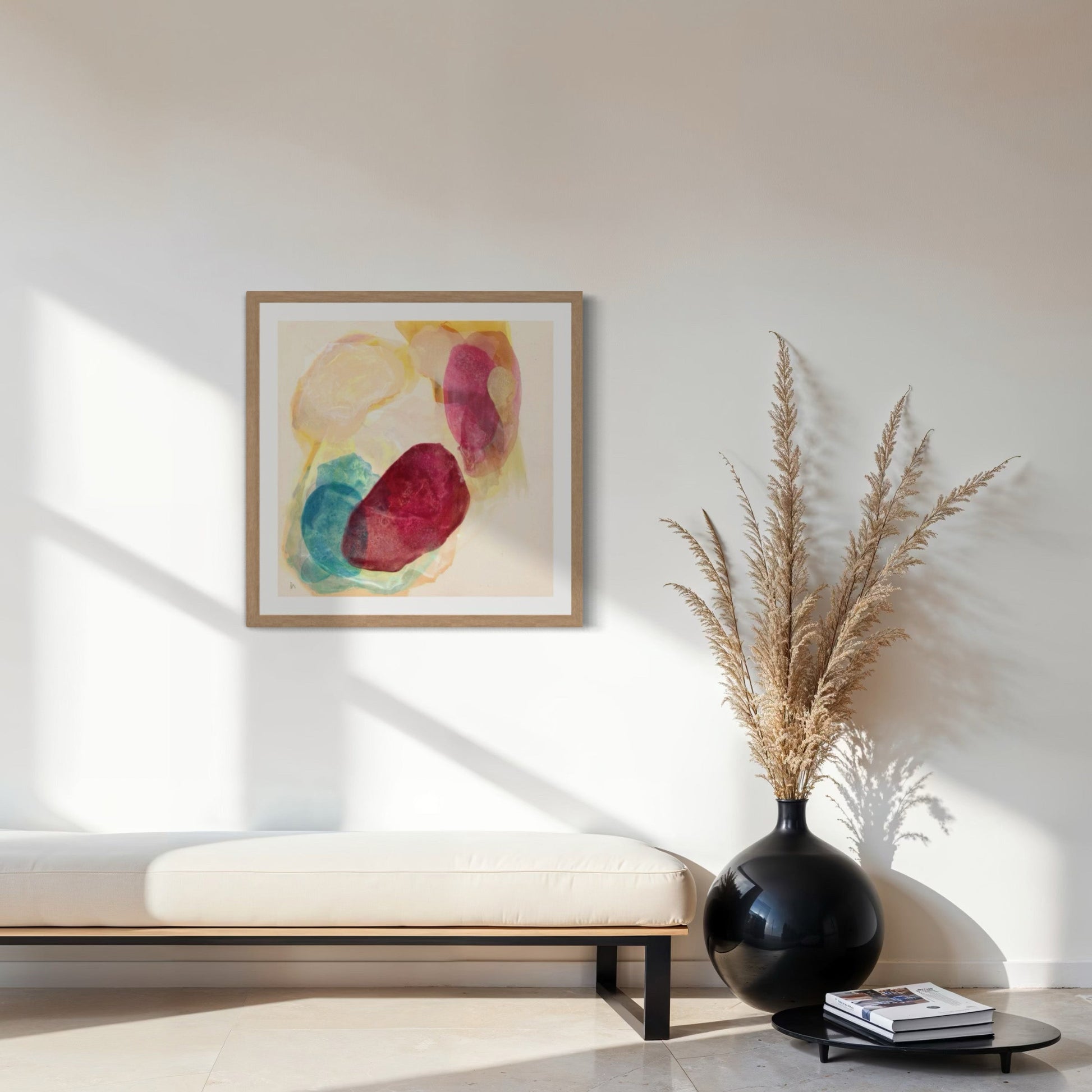 Minerals, earthy abstract art print on paper, framed in a natural finish. Hanging above a modern bench. Ingeborg Andersson Art