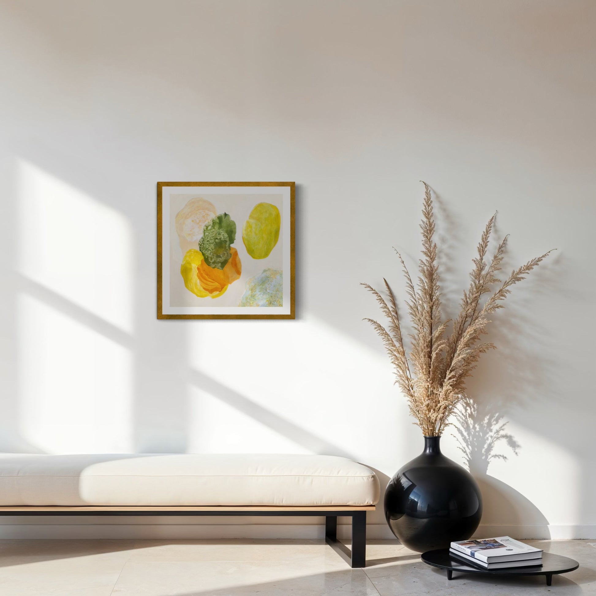 Spring, joyful abstract art print on paper, framed in a gold finish. Hanging in a seating area. Ingeborg Andersson Art