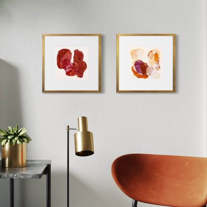 Two warm-toned mini art prints styled in a modern living room.