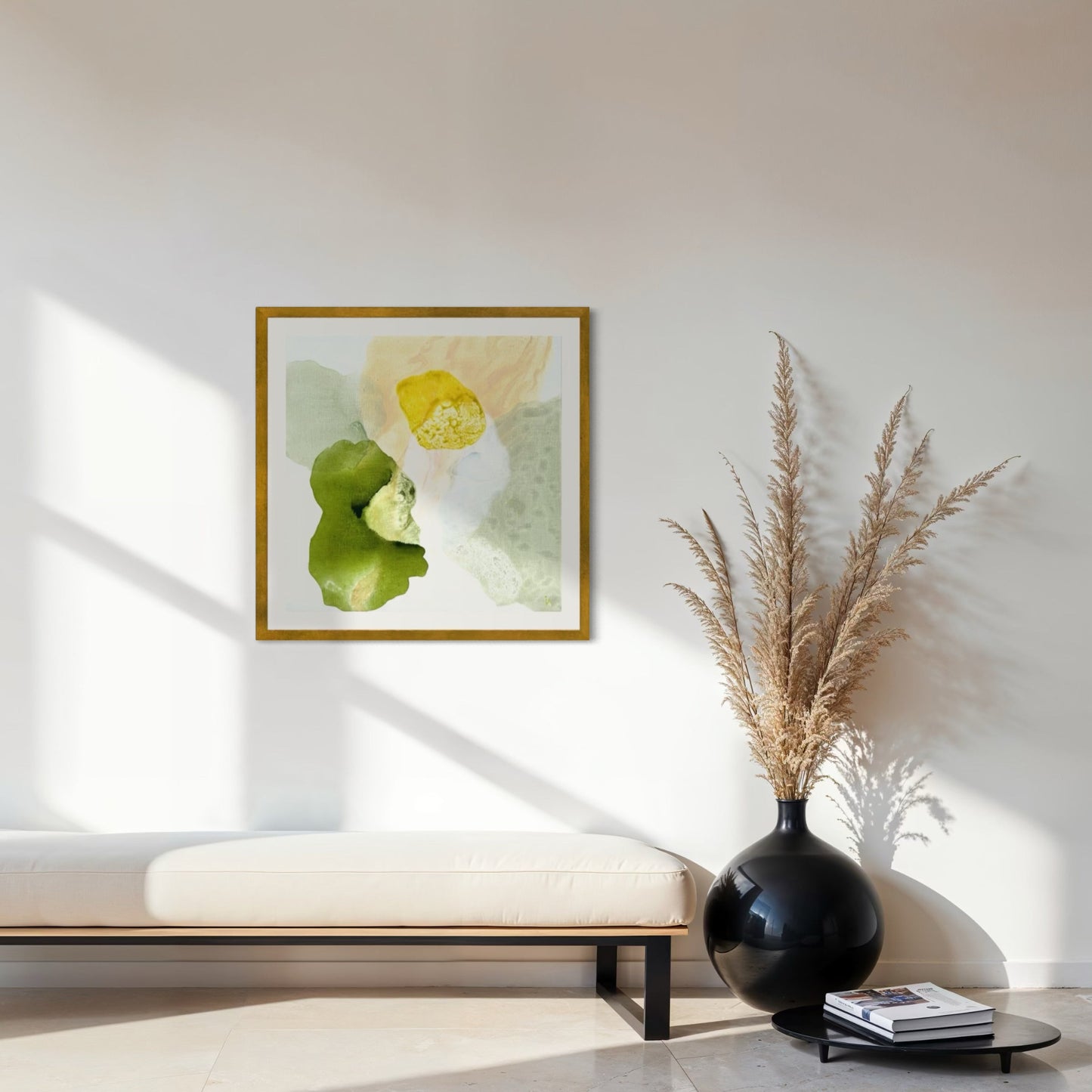 Yellow Diamond, modern abstract wall decor print on paper, framed in gold finish. Hanging above a bench. Ingeborg Andersson Art